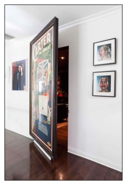 Custom framed vintage poster, traditional frame, mounted on theatre door