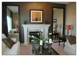Tall leaning mirrors, surround fireplace, living room mirrors, dark frame